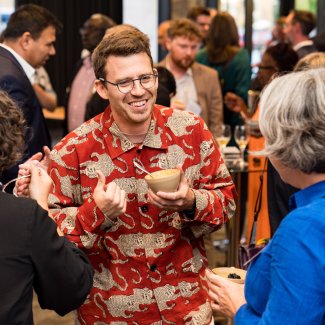 people talking in crowd