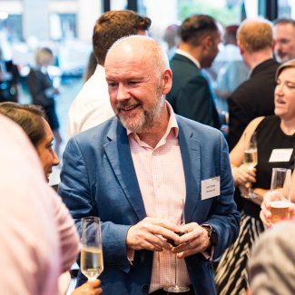 John Dickie CEO talking to group